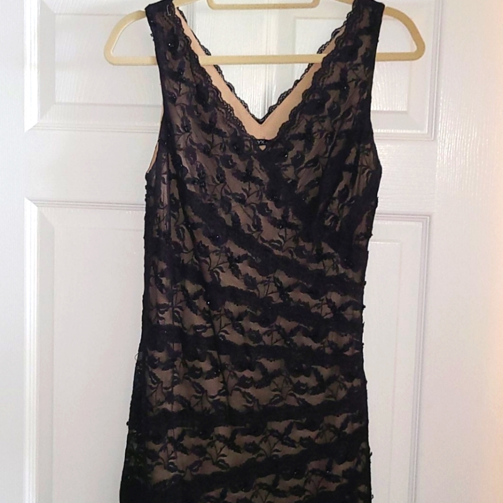 Black lacey dress with subtle black beading, nude
